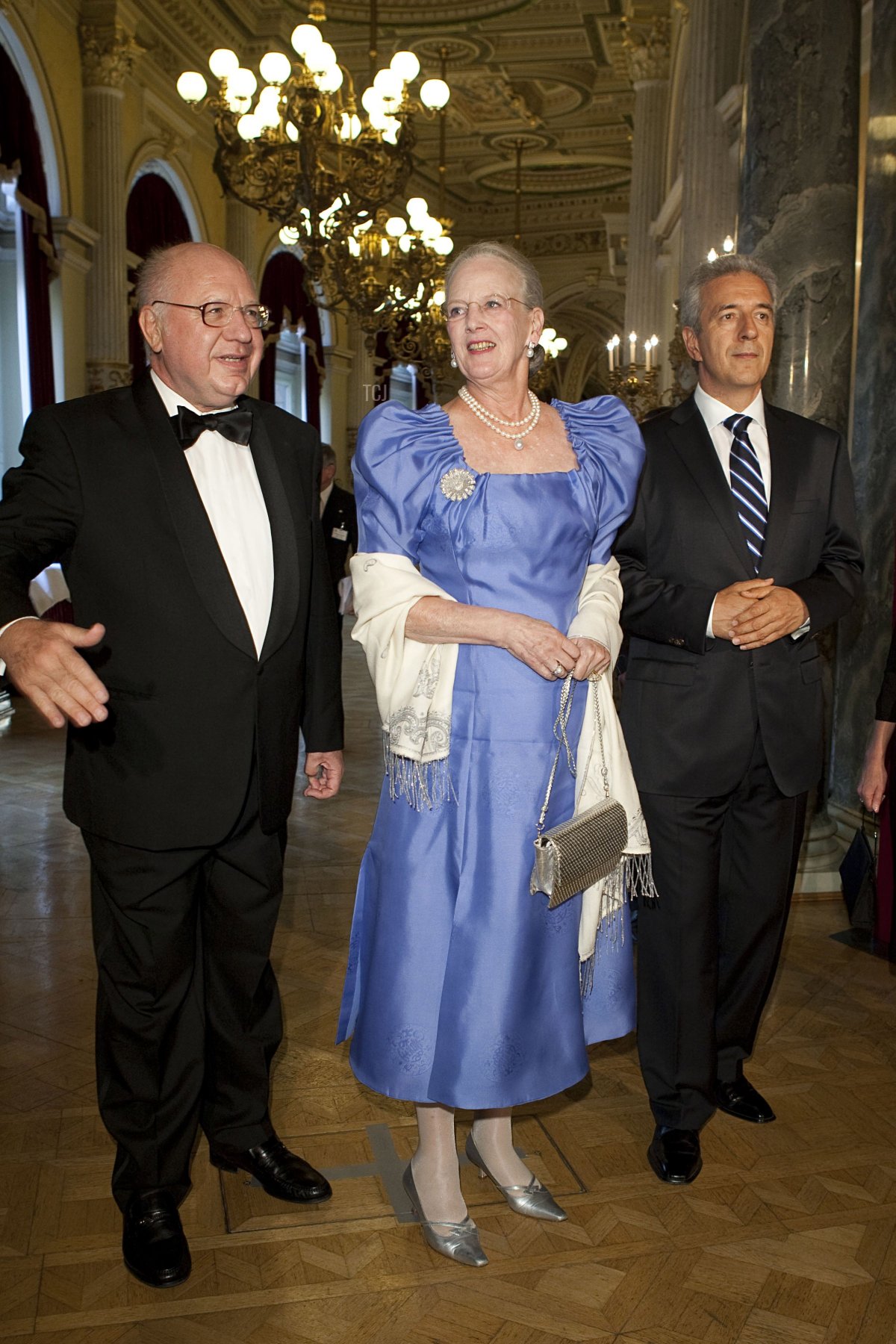 Queen Margrethe II of Denmark, director of the opera Gerd Uecker (L) and Governor of Saxony Stanislaw Tillich (R) arrive to a performance of the ballet "Giselle" at the Semper Opera on August 22, 2009 in Dresden, Germany