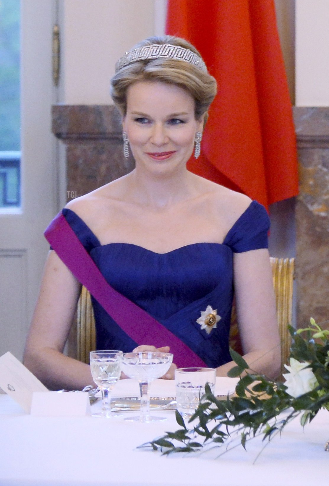 Queen Mathilde of Belgium, Chinese President Xi Jinping, King Philippe of Belgium and Chinese First Lady Peng Liyuan attend a state dinner at the Royal Castle in Laken-Laeken, Brussels, on March 31, 2014