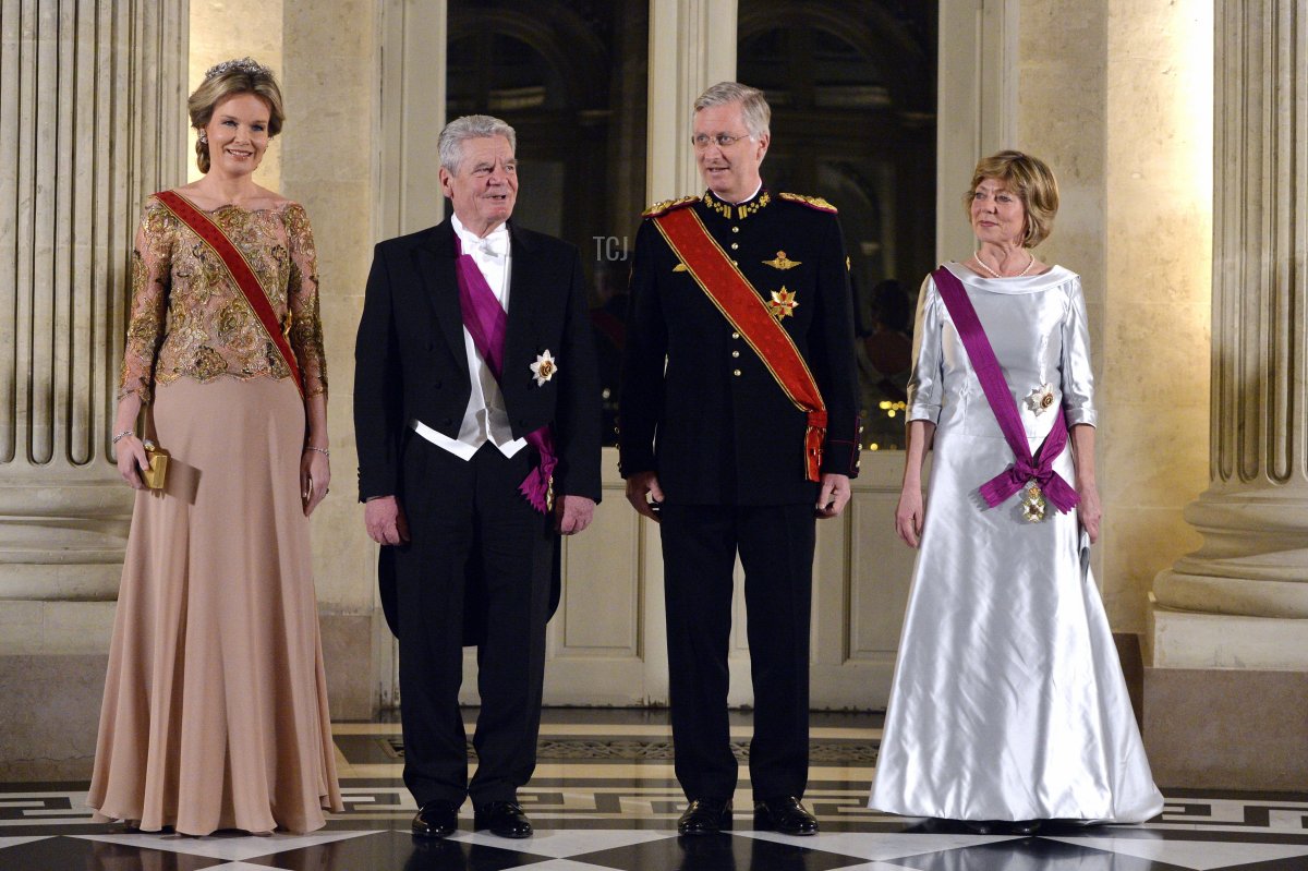 Queen Mathilde of Belgium, German President Joachim Gauck, King Philippe of Belgium and Daniela Schadt, the German president's partner, pose during a royal dinner at the Royal Castle in Brussels on March 8, 2016