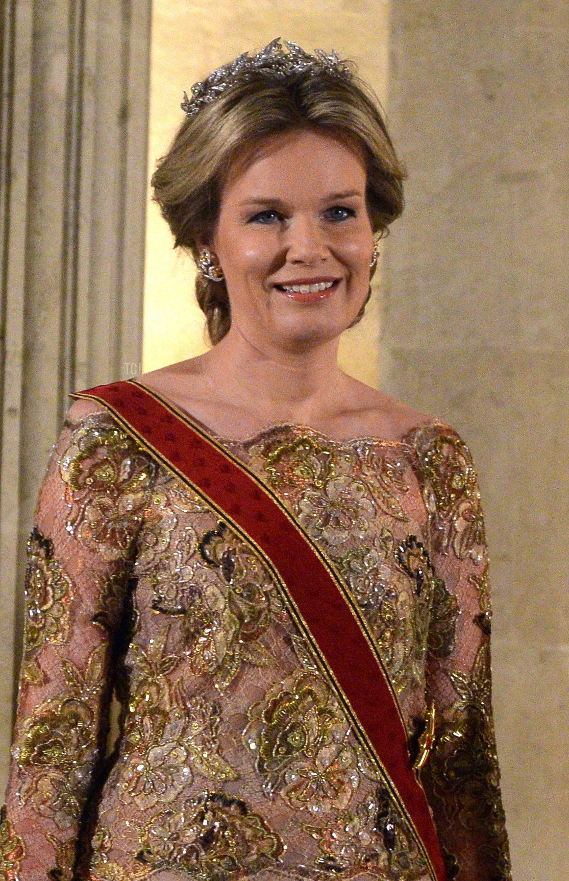 Queen Mathilde of Belgium, German President Joachim Gauck, King Philippe of Belgium and Daniela Schadt, the German president's partner, pose during a royal dinner at the Royal Castle in Brussels on March 8, 2016