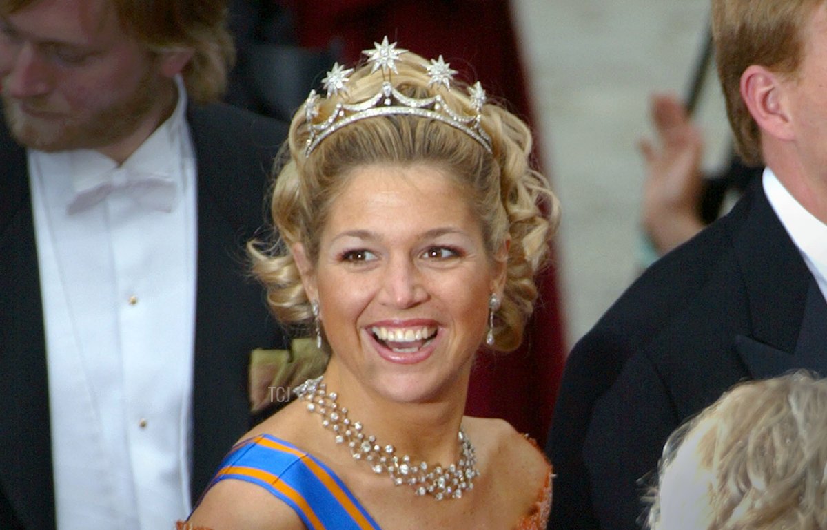 Princess Maxima laughs with Prince Willem Alexander of Holland as they leave the wedding of Princess Martha Louise of Norway to Ari Behn at the Nidaros Cathedral May 23, 2002 in Trondheim, Norway