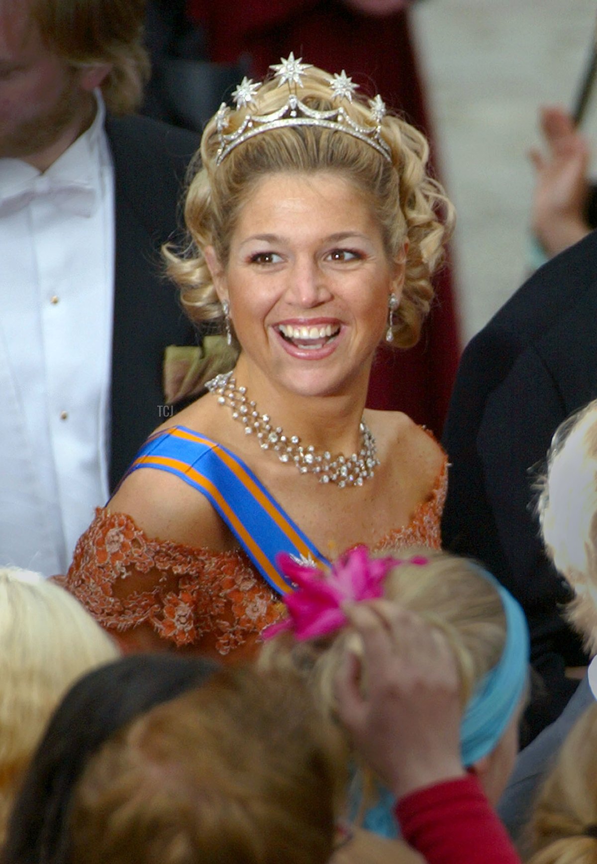 Princess Maxima laughs with Prince Willem Alexander of Holland as they leave the wedding of Princess Martha Louise of Norway to Ari Behn at the Nidaros Cathedral May 23, 2002 in Trondheim, Norway