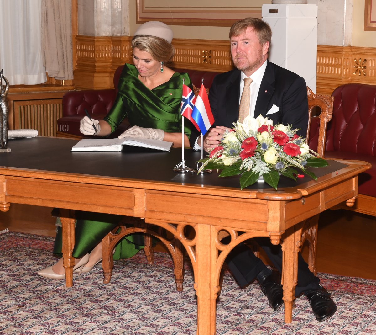 King Willem-Alexander and Queen Maxima at a signing of the guest book in the Eidsvoll Gallery at Stortinget on November 9, 2021 in Oslo, Norway