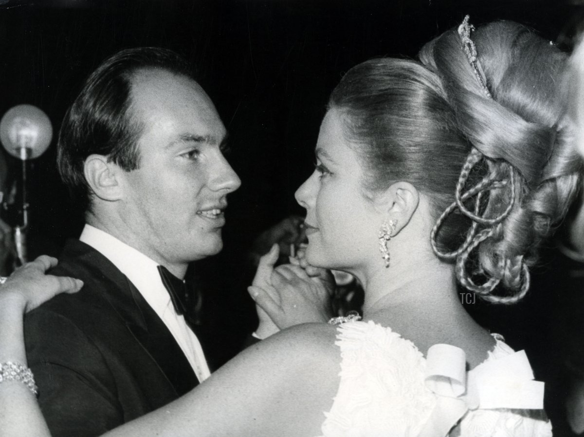 Princess Grace dances with the Aga Khan at the Bal de Petit Lits Blancs in Monaco, July 1966