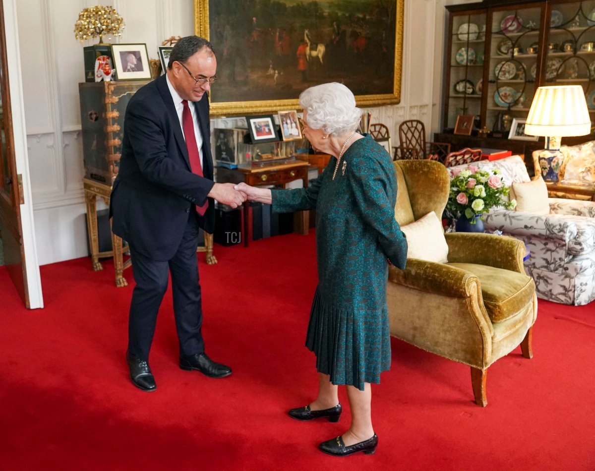 Britain's Queen Elizabeth II receives the Governor of the Bank of England Andrew Bailey during an audience in the Oak Room at Windsor Castle, Berkshire on November 24, 2021