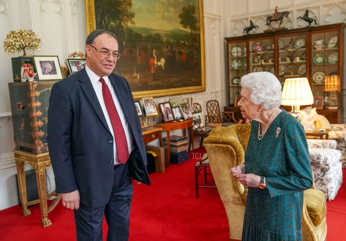 Britain's Queen Elizabeth II receives the Governor of the Bank of England Andrew Bailey during an audience in the Oak Room at Windsor Castle, Berkshire on November 24, 2021