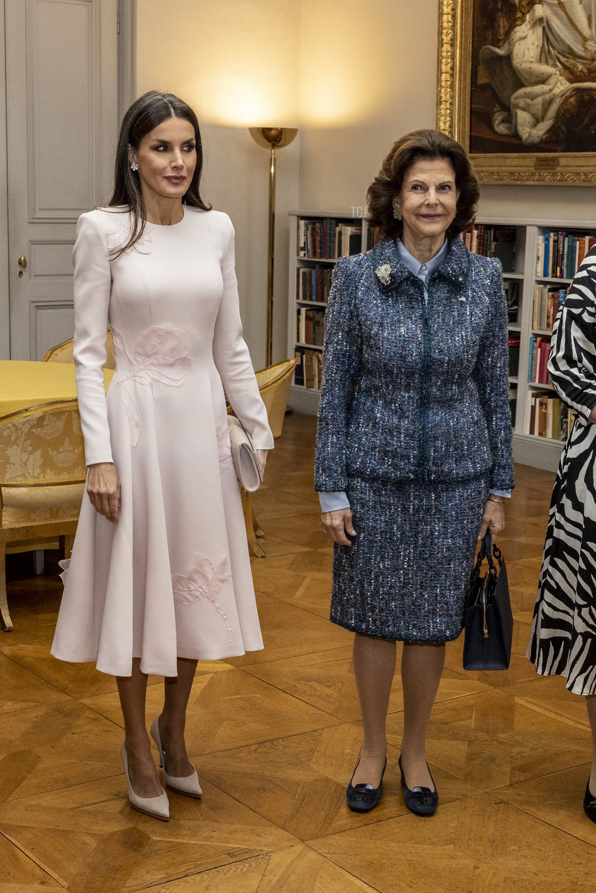 Queen Letizia of Spain and Queen Silvia of Sweden arrive at the Bernadotte Library during an official state visit at the Stockholm Palace on November 25, 2021 in Stockholm, Sweden