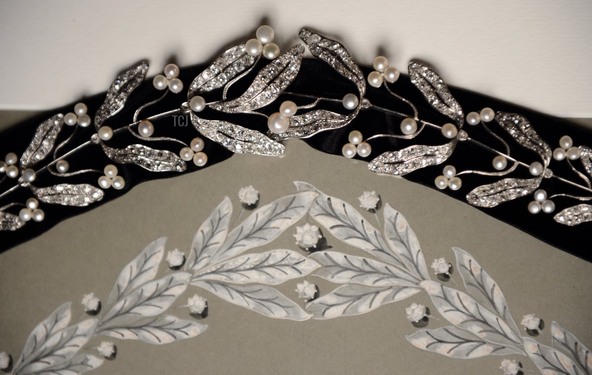 A picture taken on December 18, 2012 shows a 1910 wedding tiara with branches of mistletoe, pearls, diamonds and platinum, displayed in the Mellerio jewelry store in Paris