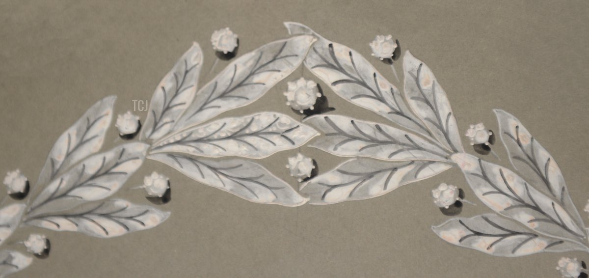 A picture taken on December 18, 2012 shows a 1910 wedding tiara with branches of mistletoe, pearls, diamonds and platinum, displayed in the Mellerio jewelry store in Paris