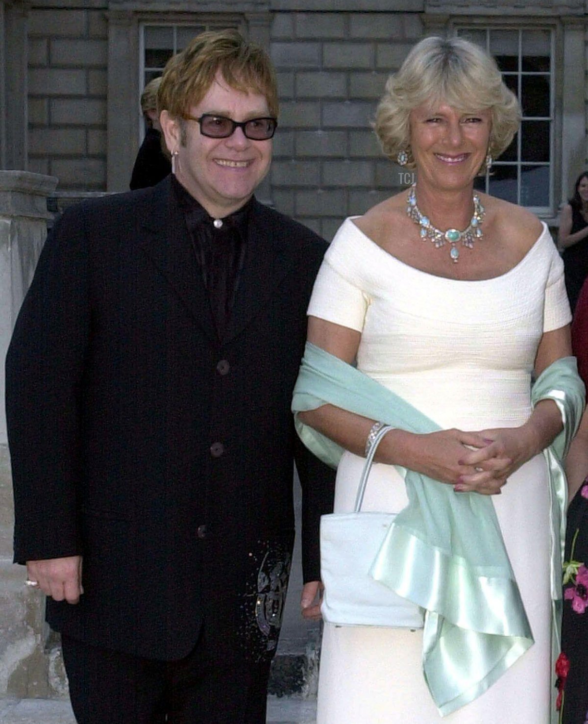 Camilla Parker Bowles with Elton John at a charity fundraising event in aid of Ark (Absolute Return for Kids) at Somerset House, London on July 11th, 2002