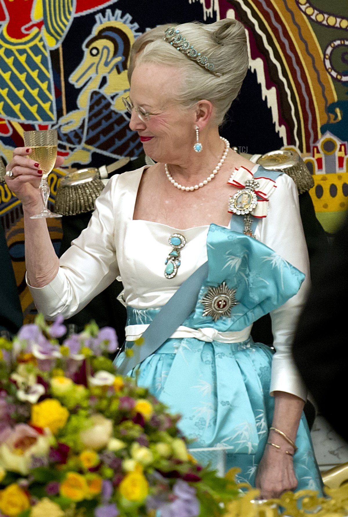 Demark's Queen Margrethe and China's President Hu Jintao take part in an official state banquet at Christiansborg Palace in Copenhagen on June 15, 2012