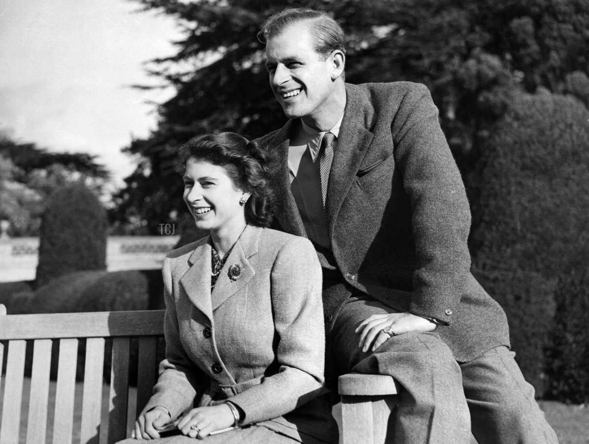 Britain's Princess Elizabeth (future Queen Elizabeth II) and her husband Philip, Duke of Edinburgh, pose during their honeymoon, November 25, 1947 in Broadlands estate, Hampshire