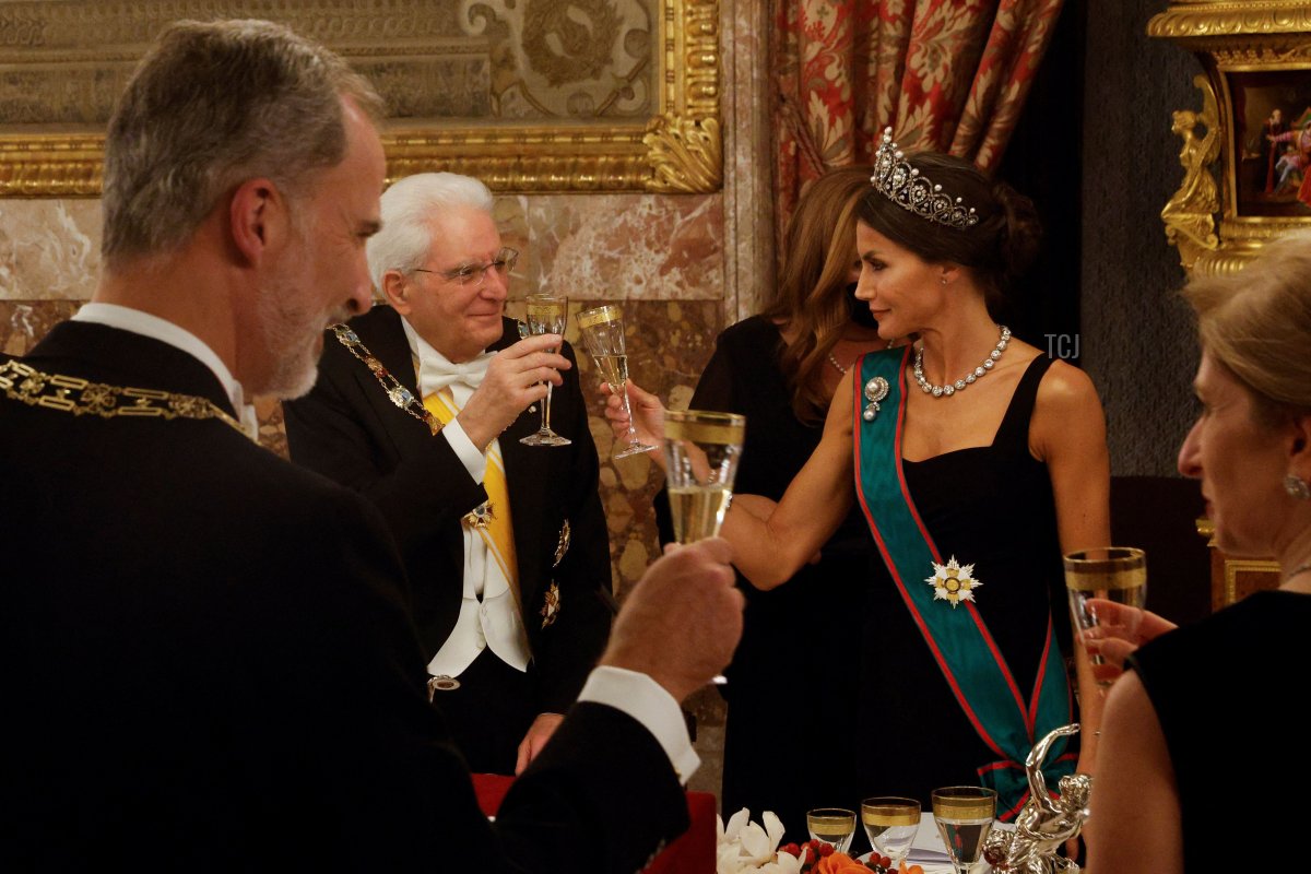 Spain's Queen Letizia (R) toasts with Italy's President Sergio Mattarella (L) during an official state dinner at the Royal Palace of Madrid, on November 16, 2021