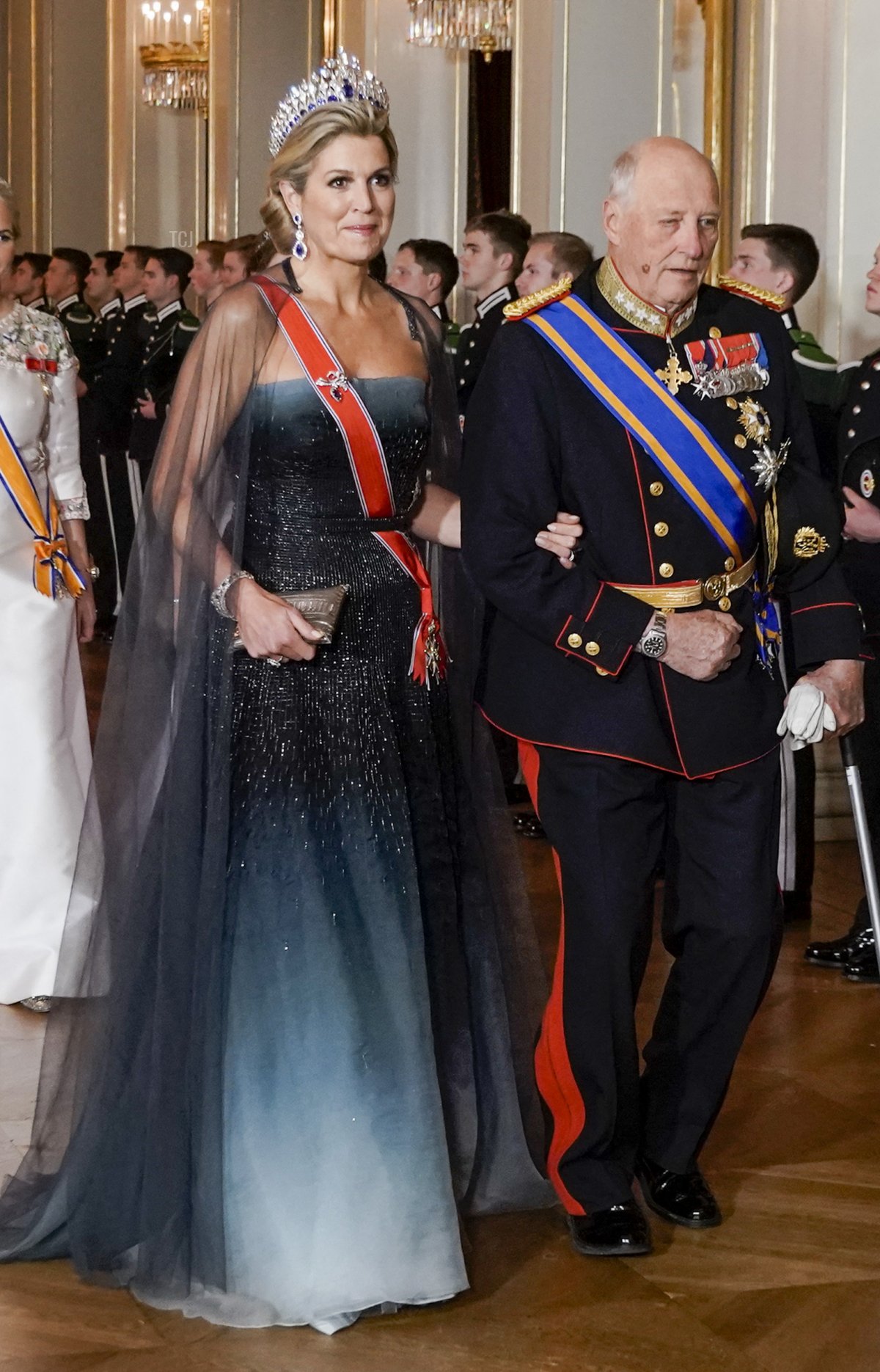 Queen Maxima of the Netherlands (C) walks wiht King Harald of Norway followed by Norway's Crown Princess Mette-Marit as they arrive for a gala dinner at the palace in Oslo on November 9, 2021, on the first day of the state visit from the Netherlands