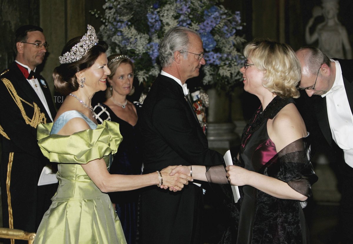 H.M. King Carl Gutaf XVI and Queen Silvia greet guests as they arrive for the Gala Dinner at Royal Palace to celebrate King Carl XVI Gustaf of Sweden's 60th Birthday on April 30, 2006 in Stockholm, Sweden