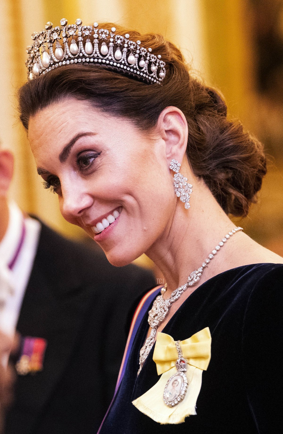 Catherine, Duchess of Cambridge talks to guests at an evening reception for members of the Diplomatic Corps at Buckingham Palace on December 11, 2019 in London, England