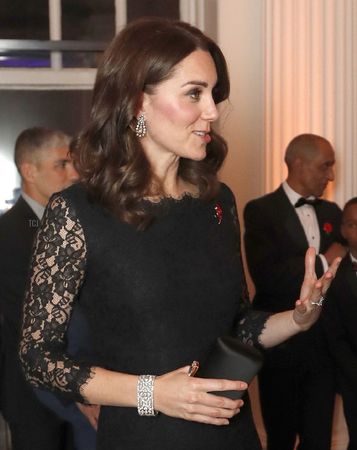 Britain's Catherine, Duchess of Cambridge speaks to Peter Fonagy, CEO of the Anna Freud Center at the 2017 Gala Dinner for The Anna Freud National Centre for Children and Families (AFNCCF), at Kensington Palace in London on November 7, 2017