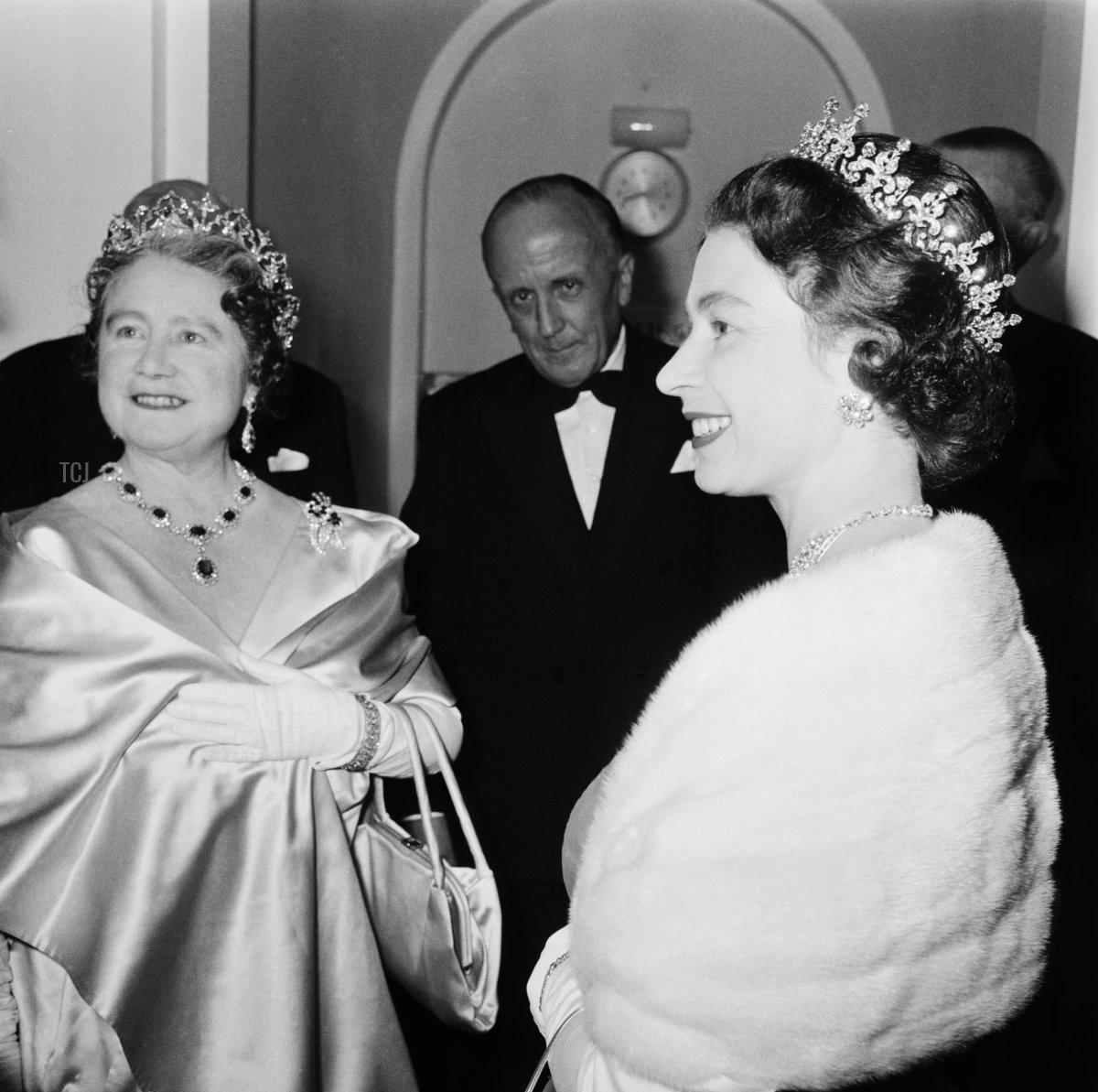 Queen Elizabeth II and the Queen Mother (1900 - 2002) attend a performance at RADA (the Royal Academy of Dramatic Art), to celebrate the drama school's Diamond Jubilee (60th anniversary), London, UK, November 1964