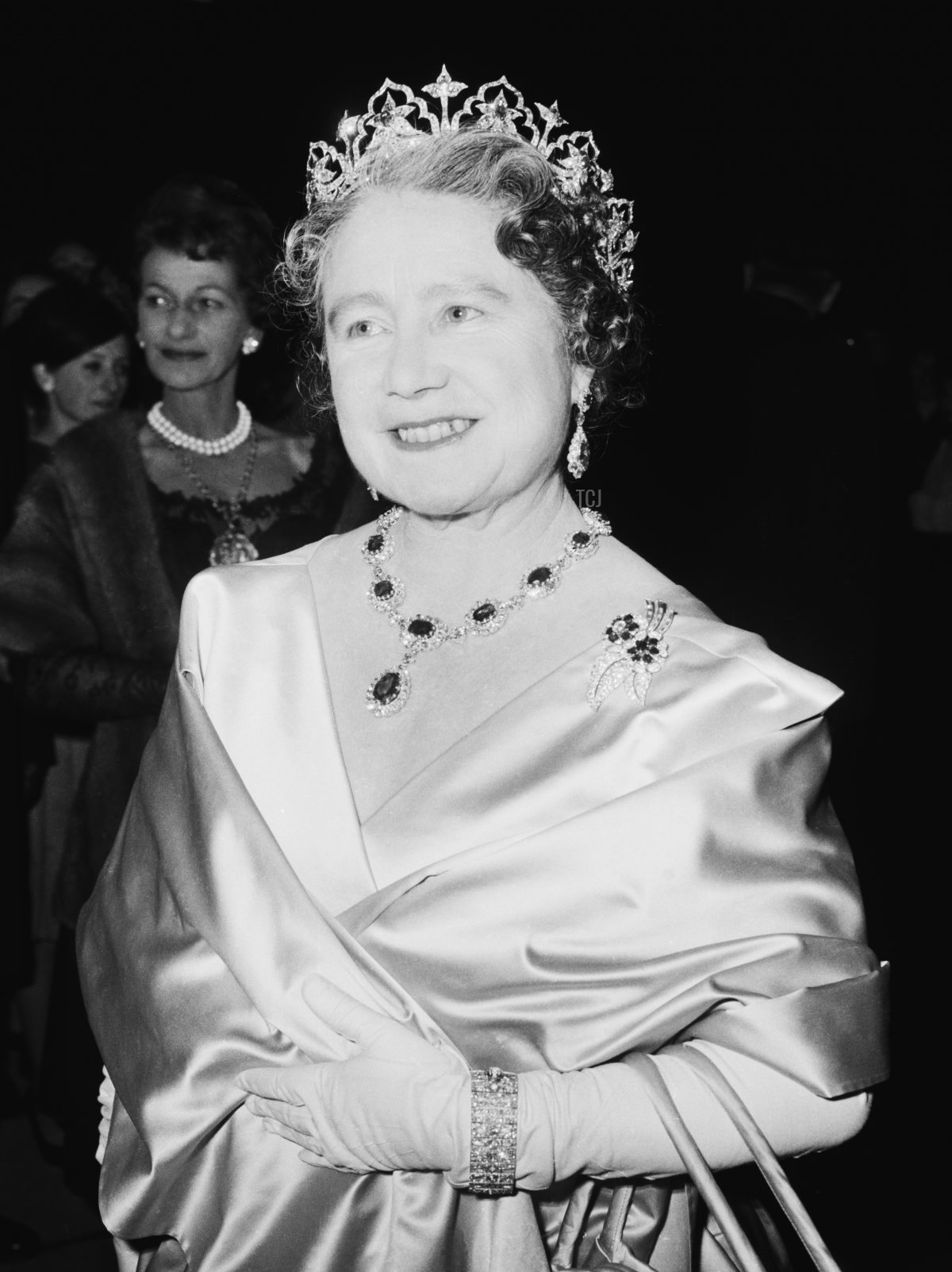The Queen Mother (1900 - 2002) attends a performance at RADA (the Royal Academy of Dramatic Art), to celebrate the drama school's Diamond Jubilee (60th anniversary), London, UK, November 1964