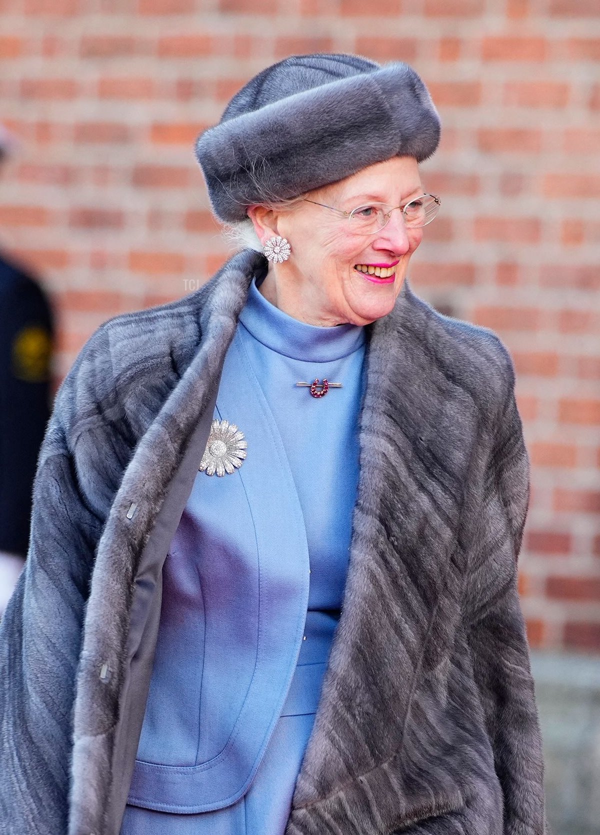 Queen Margrethe II of Denmark leaves after visiting the tomb of her father, Frederick IX of Denmark, at Roskilde Cathedral on the day of Queen's 50th anniversary of her accession to the throne, in Roskilde, Denmark, on January 14, 2022