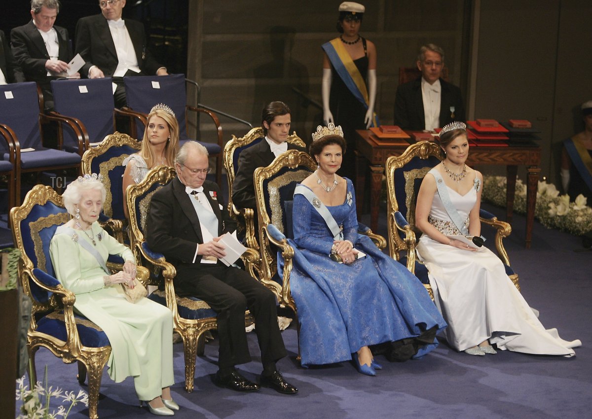 (Back row, L-R) Princess Madeleine of Sweden and Prince Carl Philip of Sweden, (front row, L-R) Princess Lilian of Sweden, King Carl XVI Gustaf of Sweden, Queen Silvia of Sweden and Crown Princess Victoria of Sweden attend the Nobel Foundation Prize 2005 at the Concert Hall on December 10, 2005 in Stockholm, Sweden