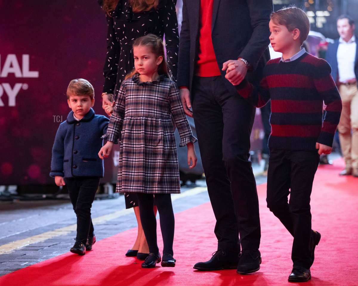 Britain's Prince William, Duke of Cambridge, his wife Britain's Catherine, Duchess of Cambridge, and their children Britain's Prince George of Cambridge (R), Britain's Princess Charlotte of Cambridge (3rd L) and Britain's Prince Louis of Cambridge (L) arrive to attend a special pantomime performance of The National Lotterys Pantoland at London's Palladium Theatre in London on December 11, 2020, to thank key workers and their families for their efforts throughout the pandemic