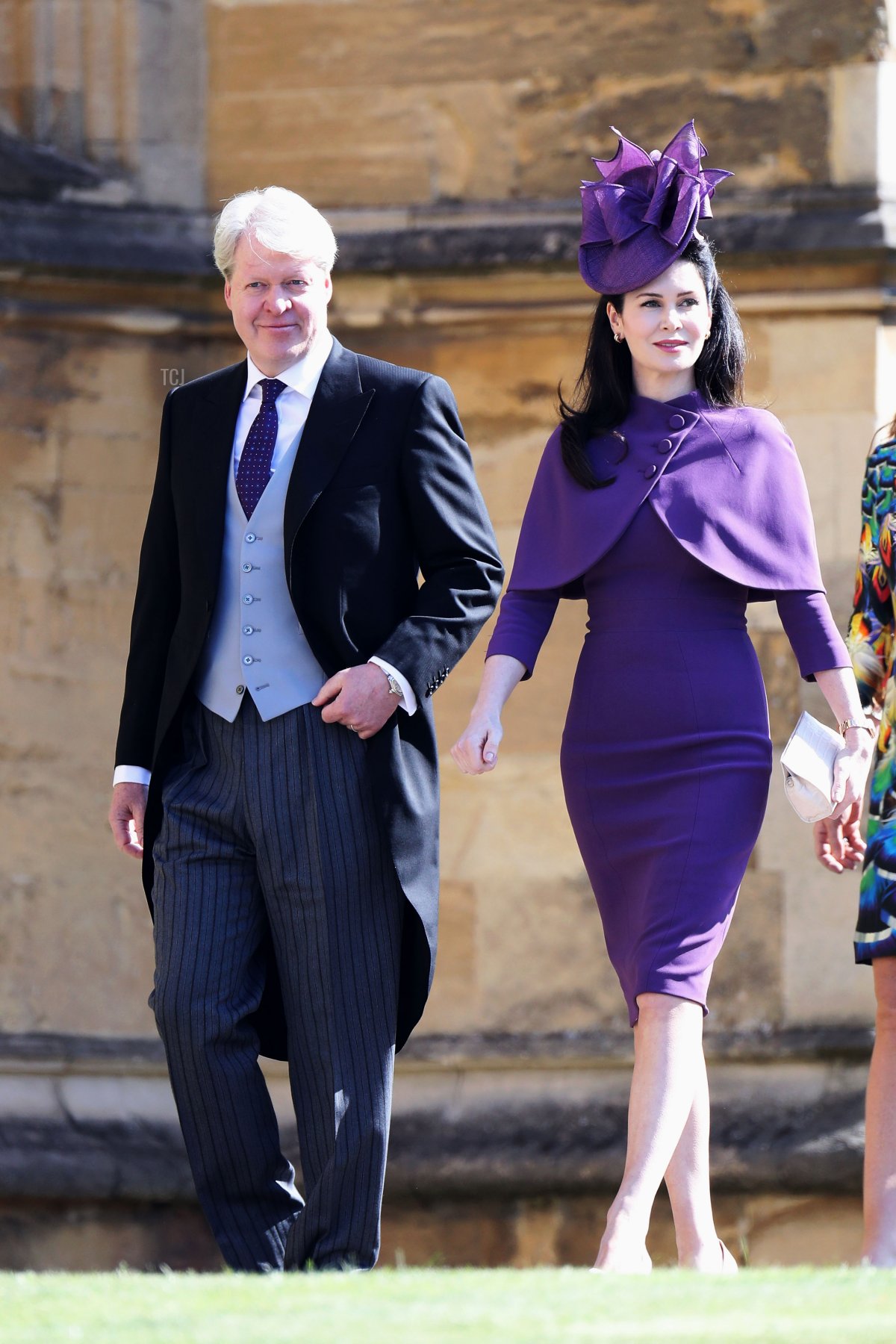 Charles Spencer, 9th Earl Spencer (L) and his wife, Karen Spencer arrive for the wedding ceremony of Britain's Prince Harry, Duke of Sussex and US actress Meghan Markle at St George's Chapel, Windsor Castle, in Windsor, on May 19, 2018