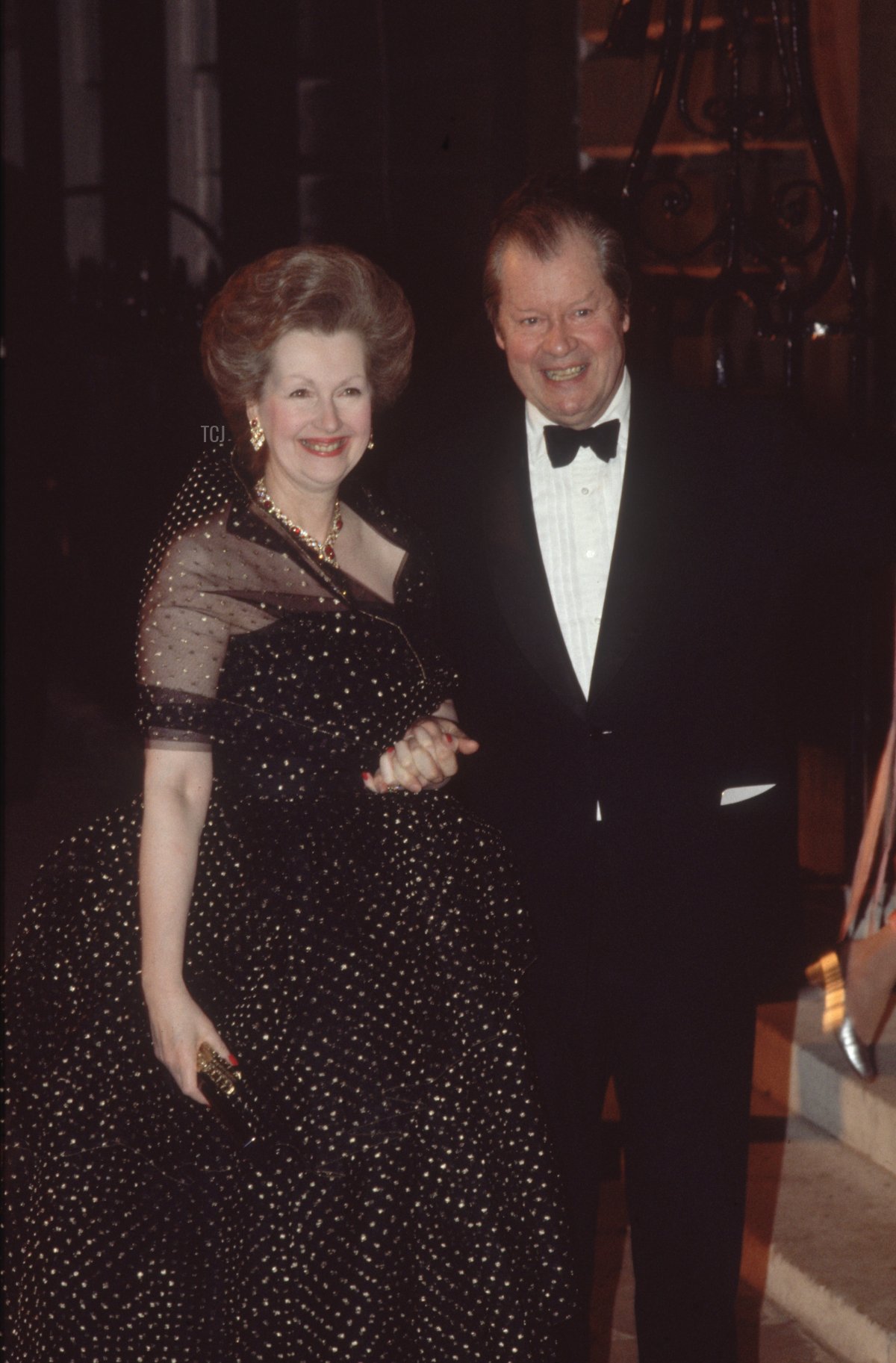 The Earl (1924 - 1992) and Countess Spencer arriving at Spencer House for the 21st birthday of the Earl's son, Viscount Charles Althorp, 1985