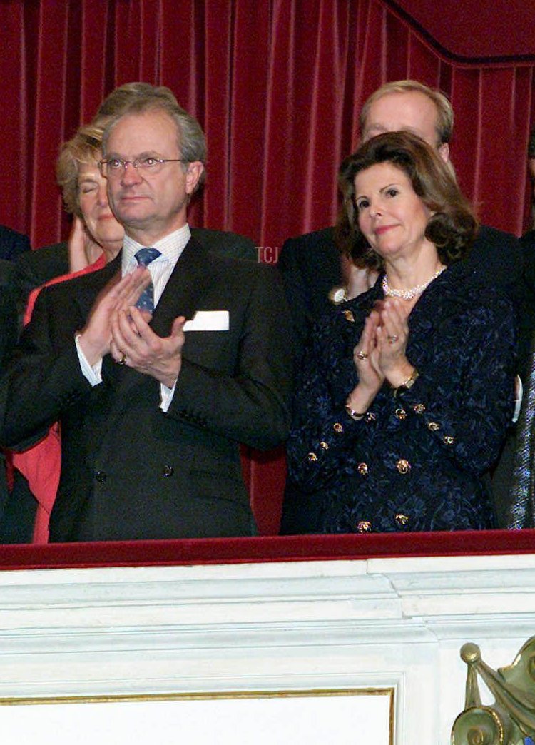 Members of the European royal families, front row, from L-R: Queen Sofia of Spain, King Carl Gustav and Queen Silvia of Sweden, Queen Sonja of Norway, King Albert II and Queen Paola of Belgium applaud at the end of a concert in Amsterdam, February 1, 2002
