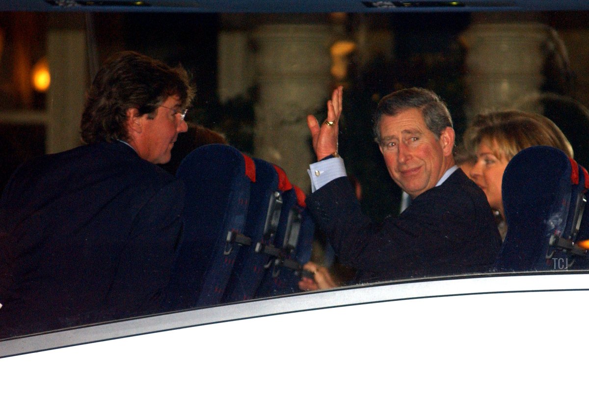 Prince Charles of Britain (C) and Queen Noor of Jordan (R) chat with Prince Ernst of Hannover (L), husband of Princess Caroline during wedding celebrations February 1, 2002