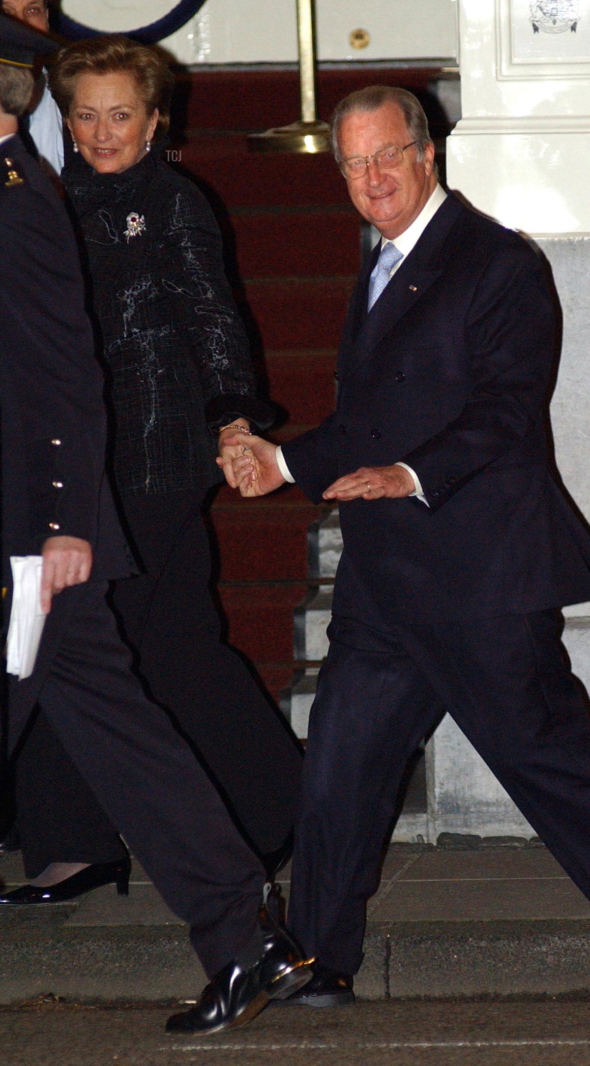 King Albert of Belgium and his wife Queen Paola are on the way to wedding celebrations February 1, 2002 in Amsterdam, Netherlands