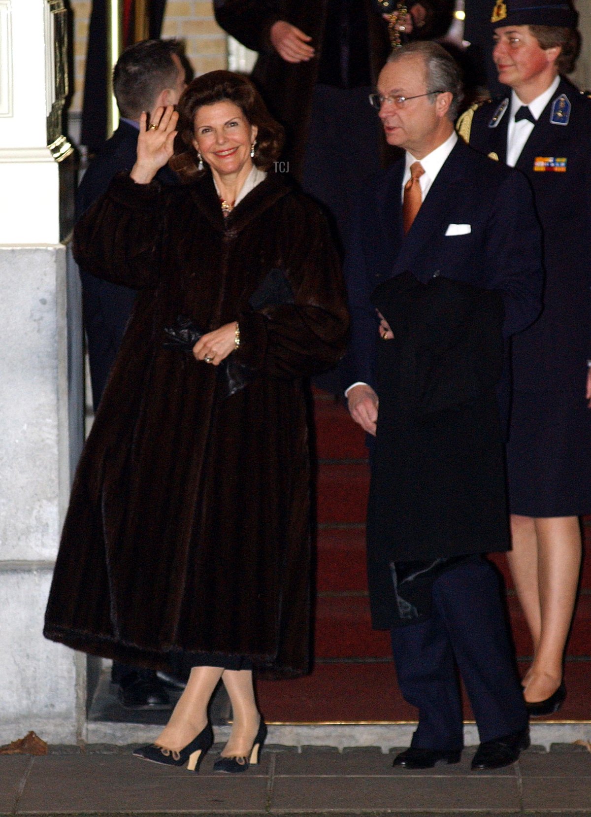 King Carl Gustav and Queen Sylvia of Sweden are on the way to wedding celebrations February 1, 2002 in Amsterdam, Netherlands