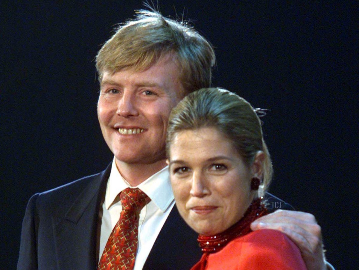 Dutch Crown Prince Willem-Alexander (L) and his fiancee Maxima Zorreguieta, of Argentina smile when being presented with the gift of the Dutch people at Amsterdam's Arena stadium Friday February 1, 2002