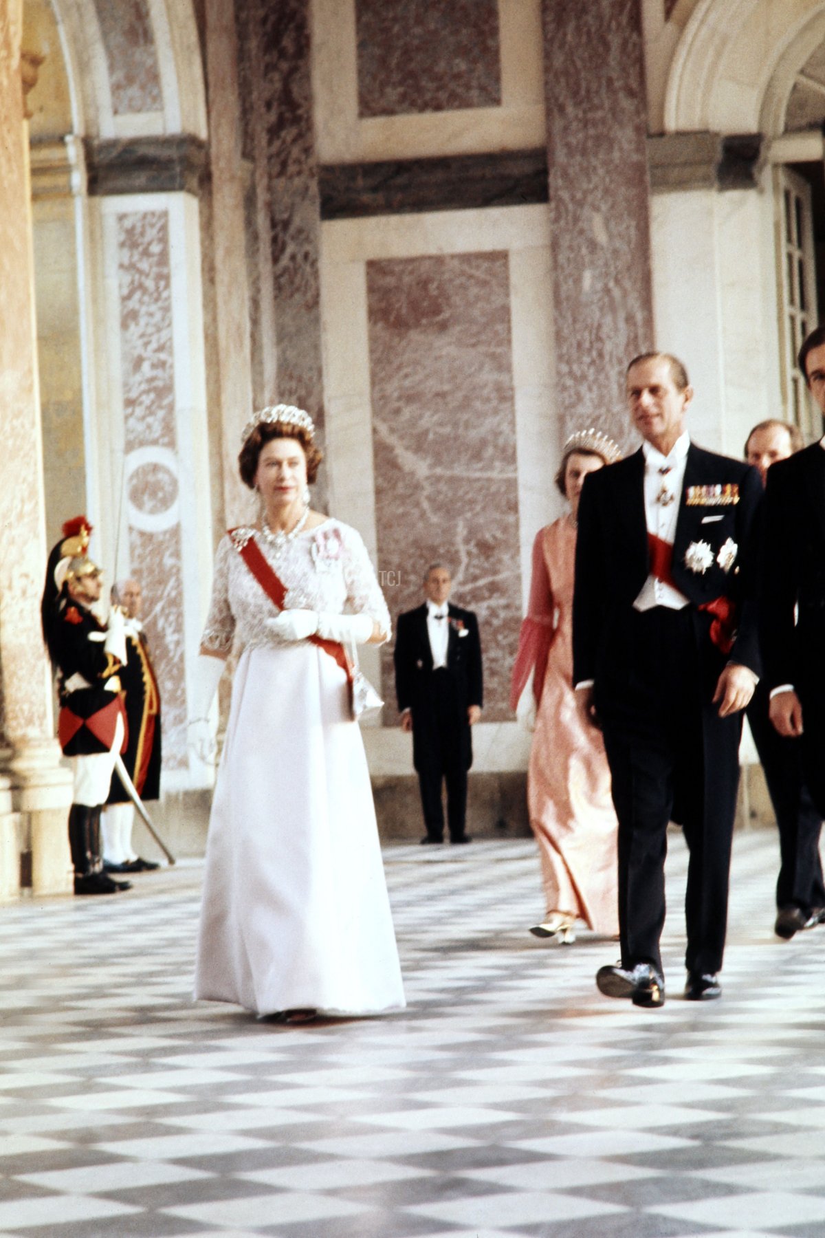 Elizabeth II of Great Britain and her husband Prince Philip, Duke of Edinburgh (L) arrive at the Trianon to attend a dinner at the Palace of Versailles, on May 15, 1972, on the first day of their State visit in France