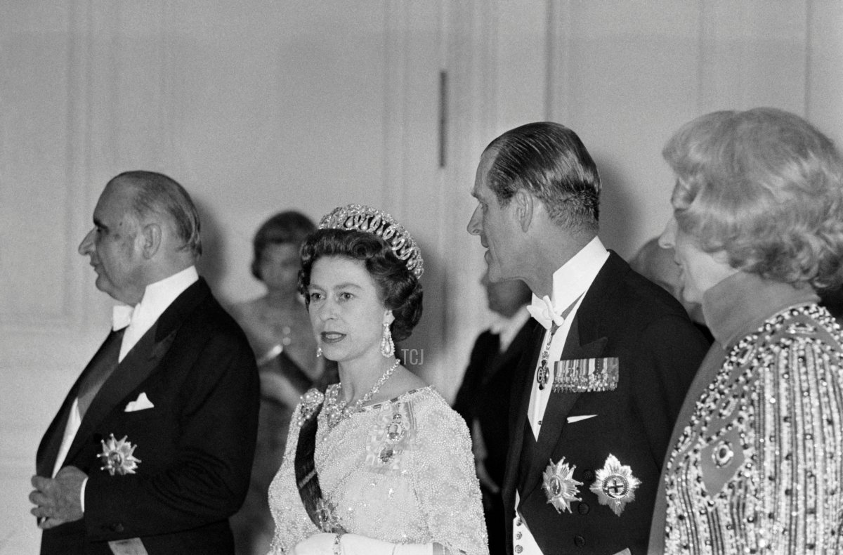 French President Georges Pompidou ( L) and his wife Claude Pompidou (R) welcome on May 15, 1972 Britain's Queen Elizabeth II (2nd L) and her husband Prince Philip (2nd R), Duke of Edinburgh, at the Trianon to attend a dinner at the Palace of Versailles, on the first day of their State visit in France