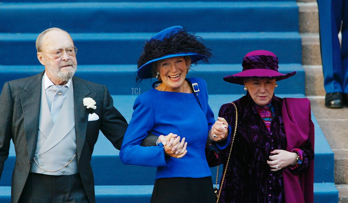 Princess Irene of Holland (C) holds the hands of Prince Bernhard of Holland (L) and Princess Christina (R) at the wedding of Dutch Crown Prince Willem Alexander and Crown Princess Maxima Zorreguieta February 2, 2002 in Amsterdam