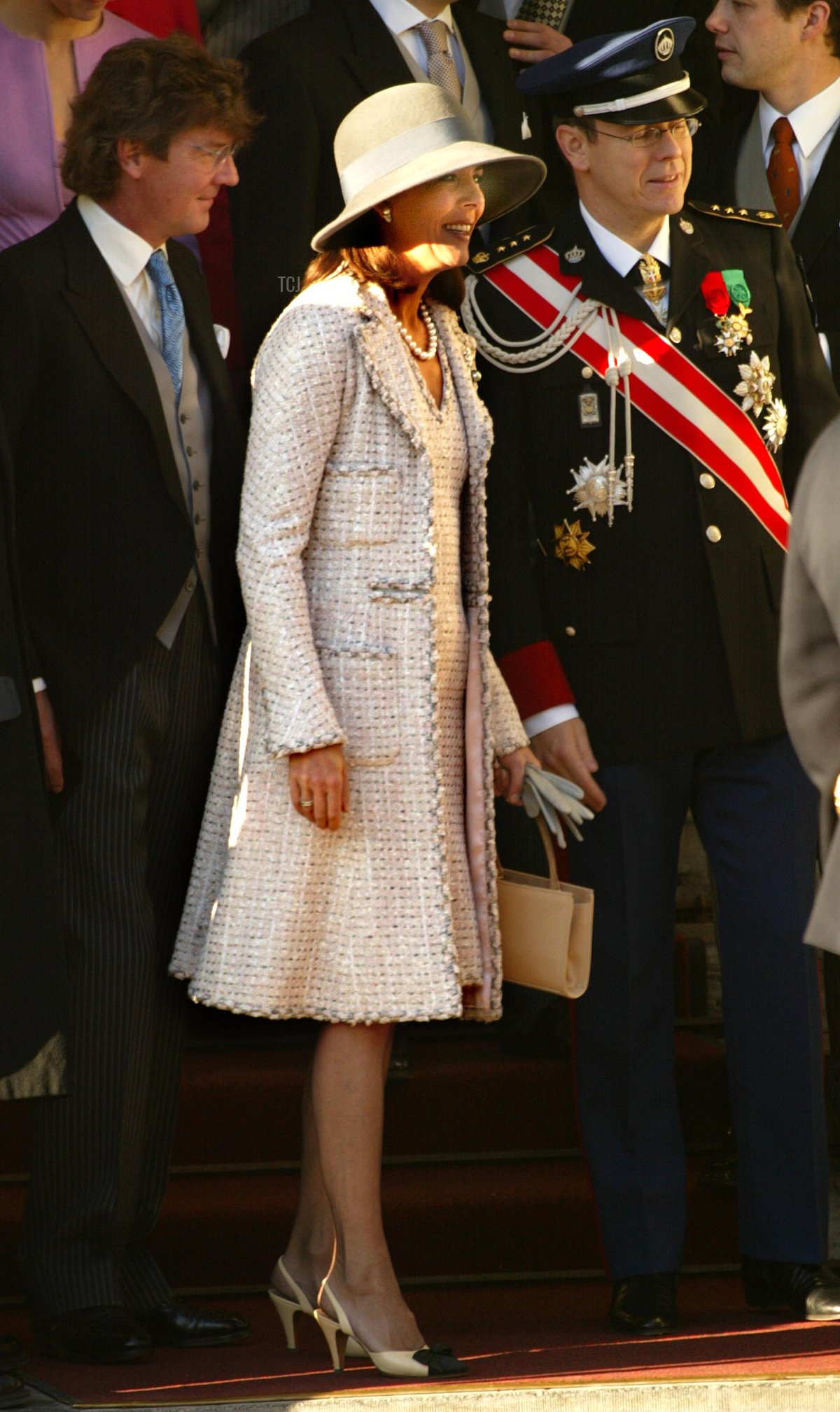 Princess Caroline of Monaco, her brother Prince Albert of Monaco (R) and her husband Ernst von Hanover are on the way to the wedding of Dutch Crown Prince Willem Alexander and Argentine Maxima Zorreguieta February 2, 2002 in Amsterdam