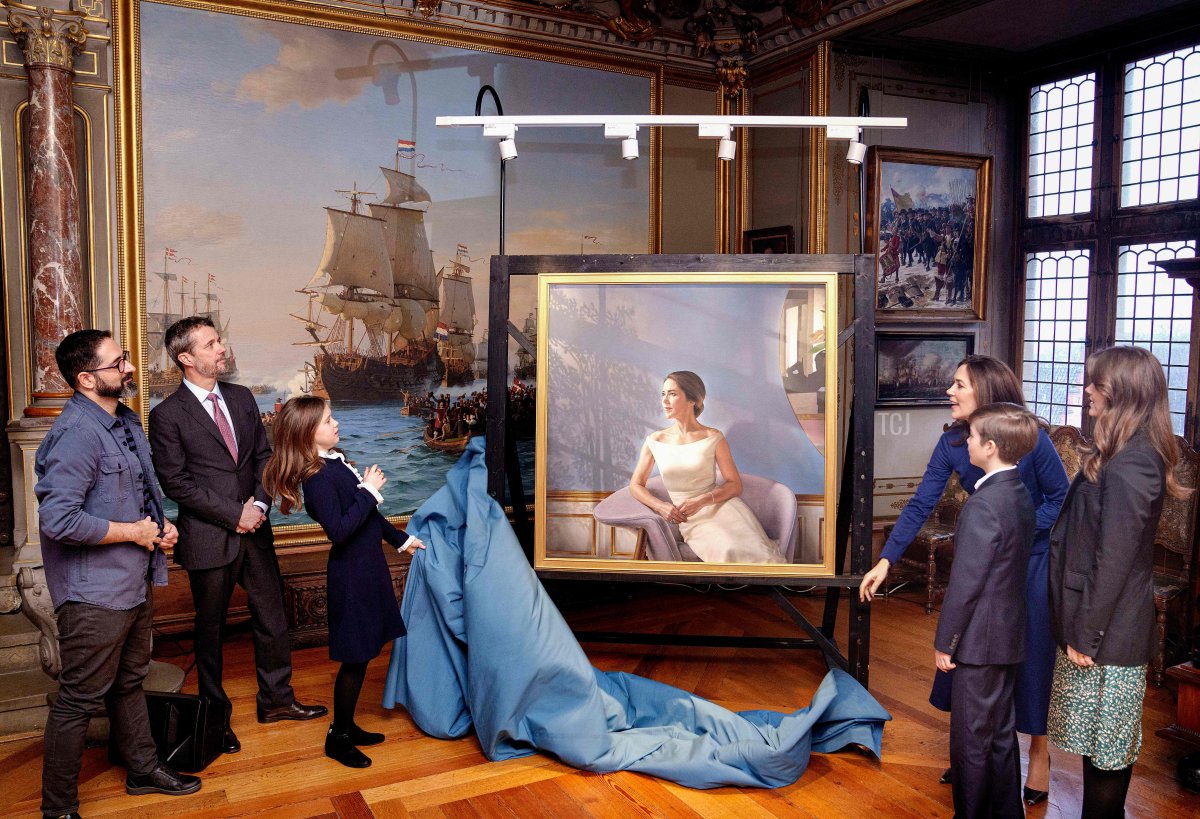 Crown princess Mary of Denmark reveals, assisted by the family, a painting of herself during the opening of the exhibition "HRH Crown Princess Mary 1972 - 2022" at the National History Museum at Frederiksborg Castle in Hillerod, Denmark on February 3, 2022