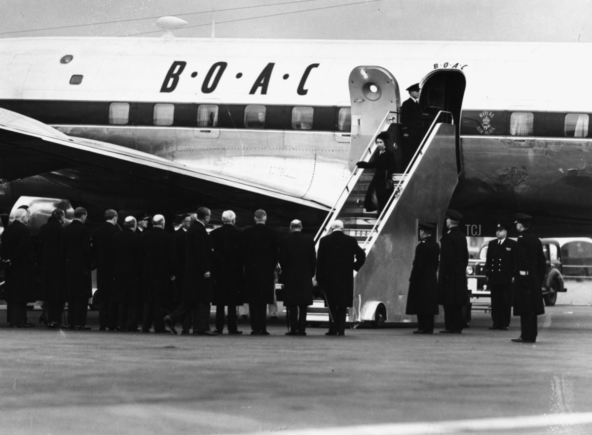 Queen Elizabeth II and Prince Philip, the Duke of Edinburgh, leaving their BOAC airliner as they return from Kenya following the death of King George VI and Elizabeth's accession to the throne, London, February 7th 1952
