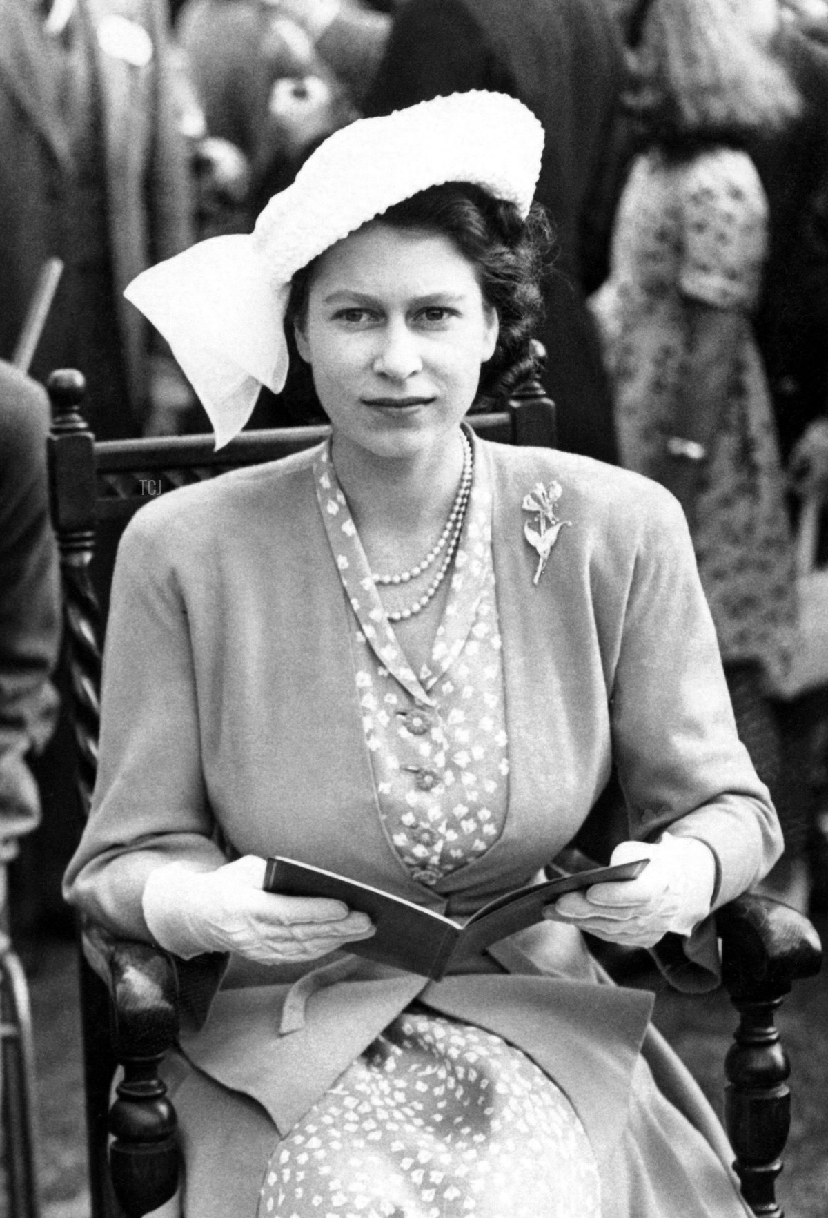 Princess Elizabeth II and Prince Philip, Duke of Edinburgh attend the Metropolitan Police Horse show in London on June 25, 1948