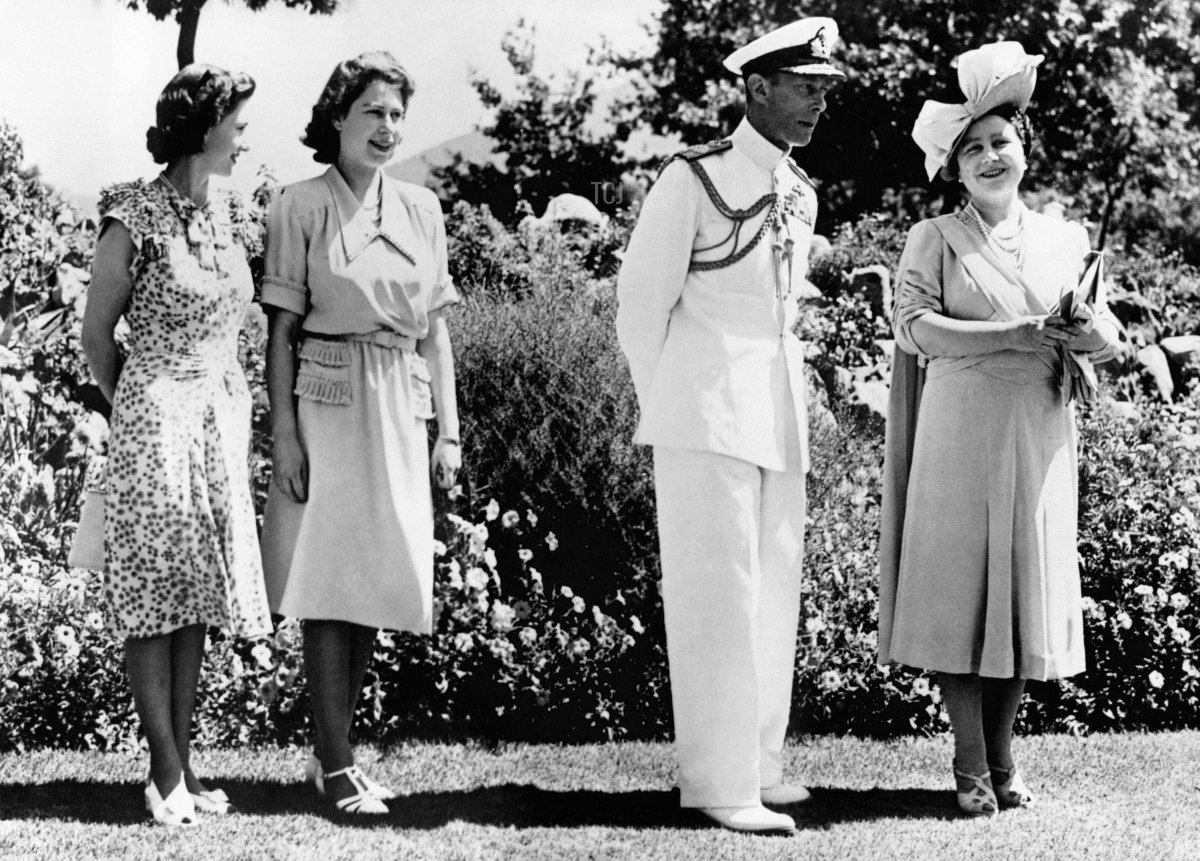 Princess Elizabeth poses with her father, King George VI, her mother Queen Elizabeth and her sister Princess Magaret in February 1947 in Cape Town during her first official state visit to South Africa