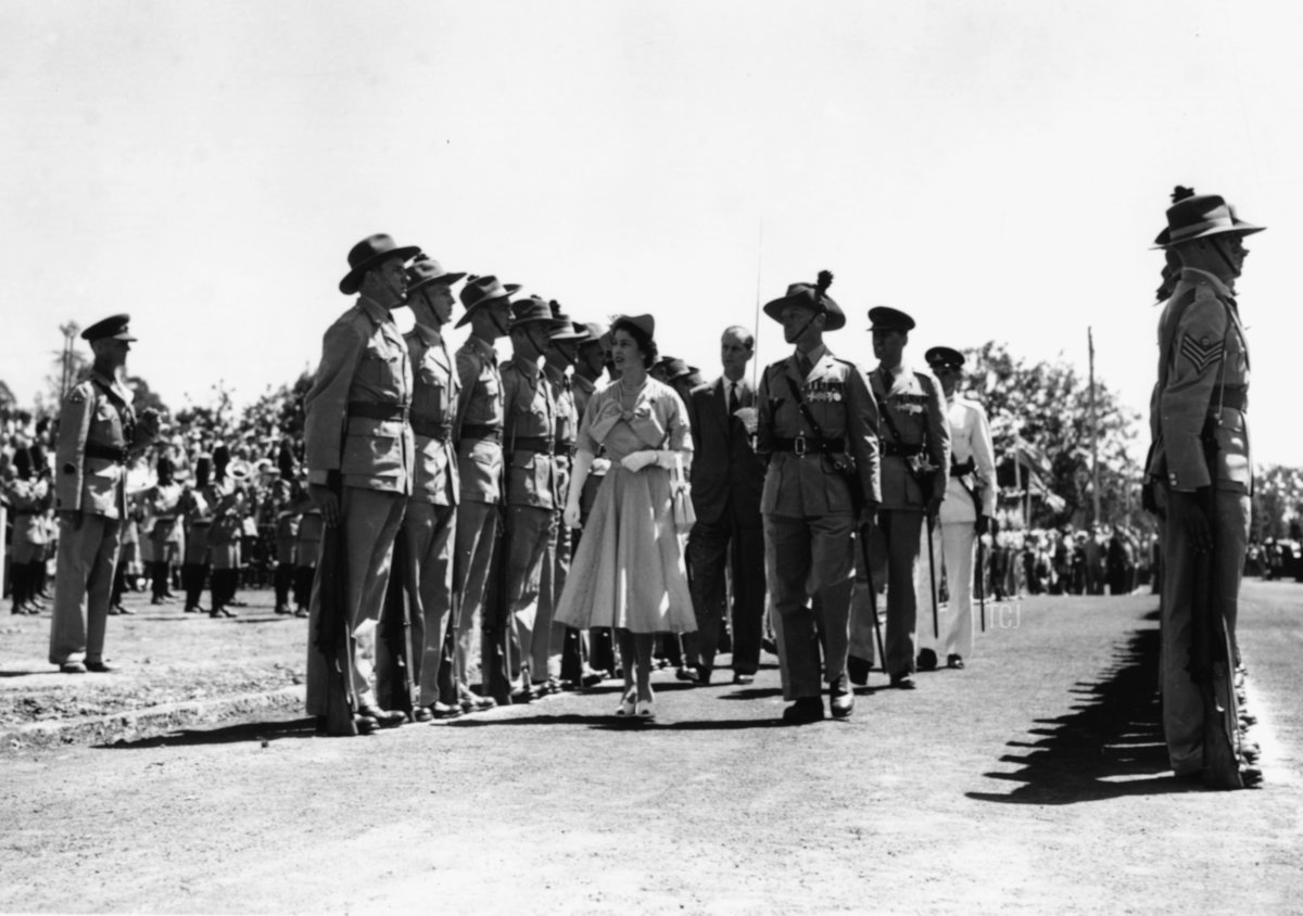 Princess Elizabeth and Prince Philip, the Duke of Edinburgh, inspecting the Guard of Honor at the Kenya Regiment Headquarters, during their Commonwealth tour, February 3rd 1952
