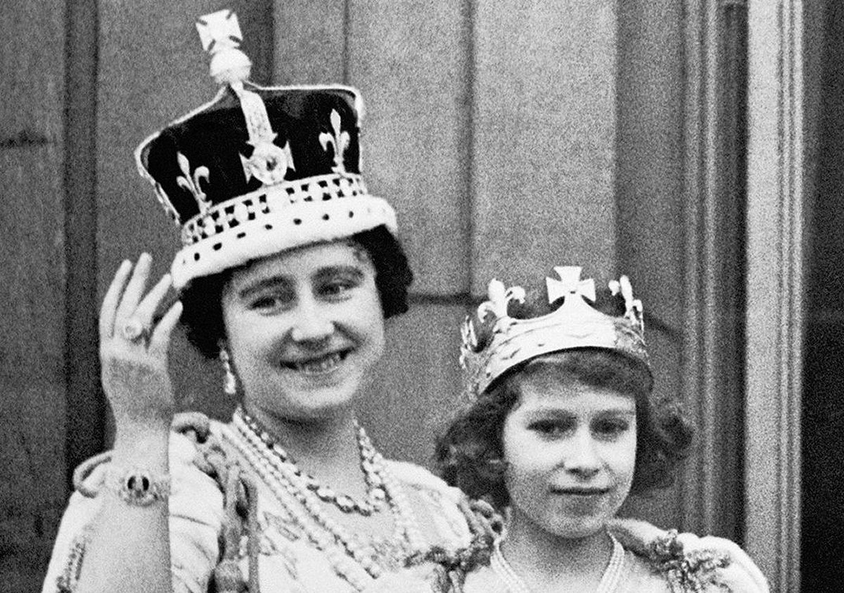 Queen Elizabeth (the Queen Mother) is with her eldest daughter Princess Elizabeth (the Queen) on the balcony of Buckingham Palace, after the coronation of King George VI