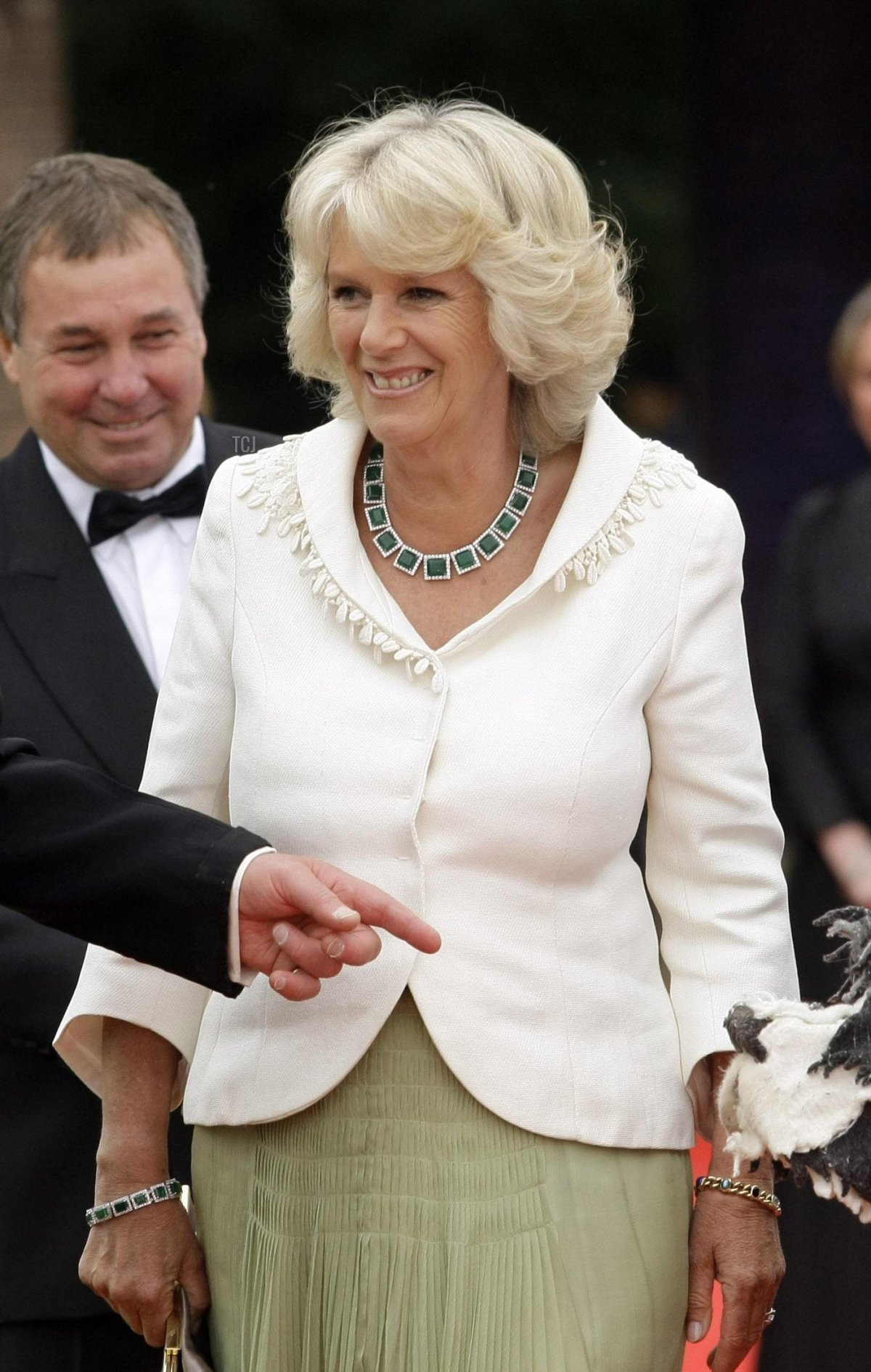 The Prince of Wales and the Duchess of Cornwall meet cast members including Mohsen Nouri (right) - the puppeteer for the dog Nana, as they arrive to attend the Royal Gala Performance of Peter Pan in London's Kensington Gardens, 17 Jun 2009