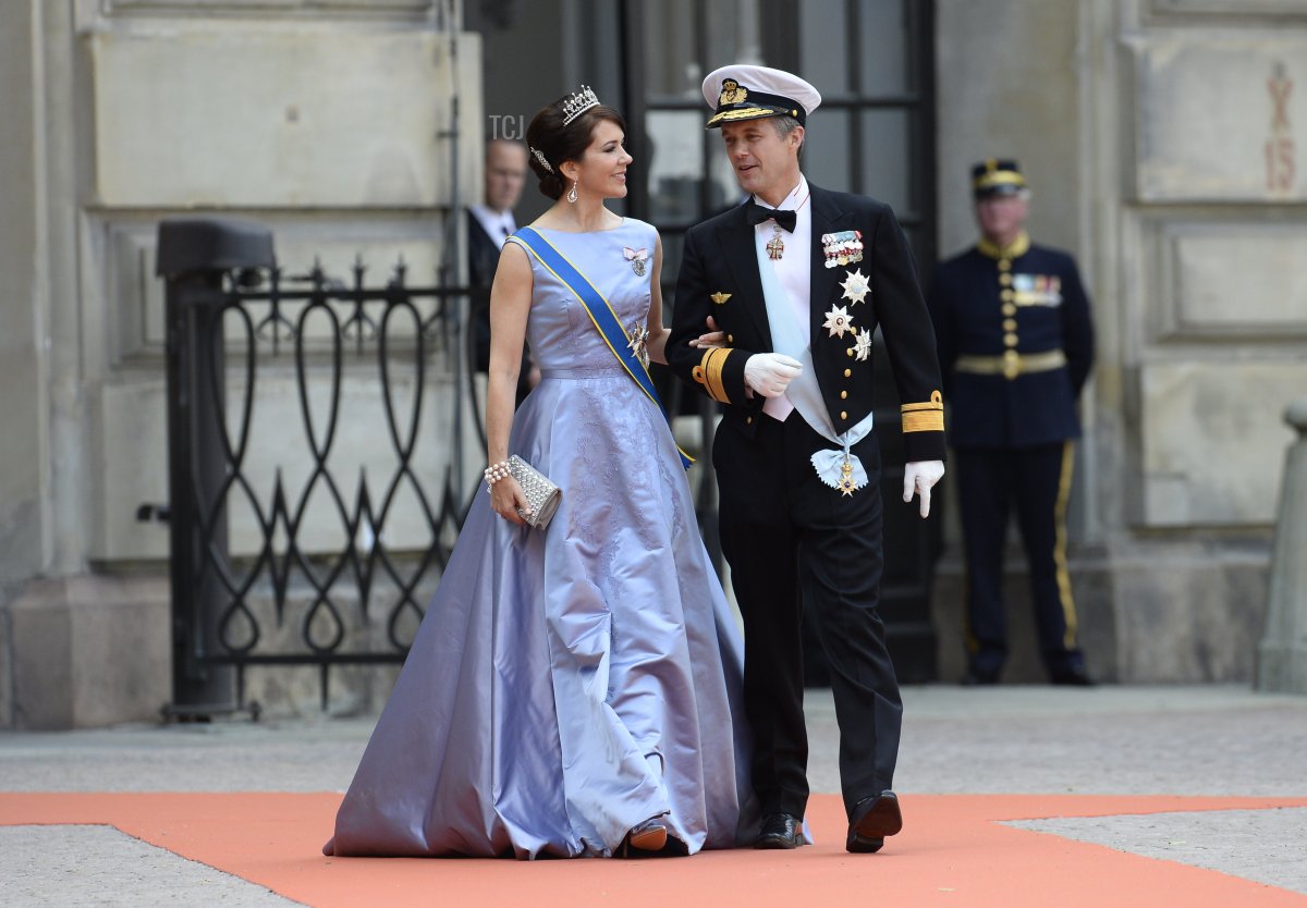 Crown Princess Mary of Denmark (L) and Crown Prince Frederik of Denmark arrive for the wedding of Sweden's Crown Prince Carl Philip and Sofia Hellqvist at Stockholm Palace on June 13, 2015