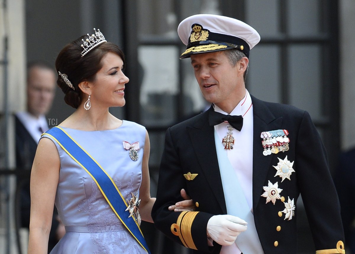 Crown Princess Mary of Denmark (L) and Crown Prince Frederik of Denmark arrive for the wedding of Sweden's Crown Prince Carl Philip and Sofia Hellqvist at Stockholm Palace on June 13, 2015