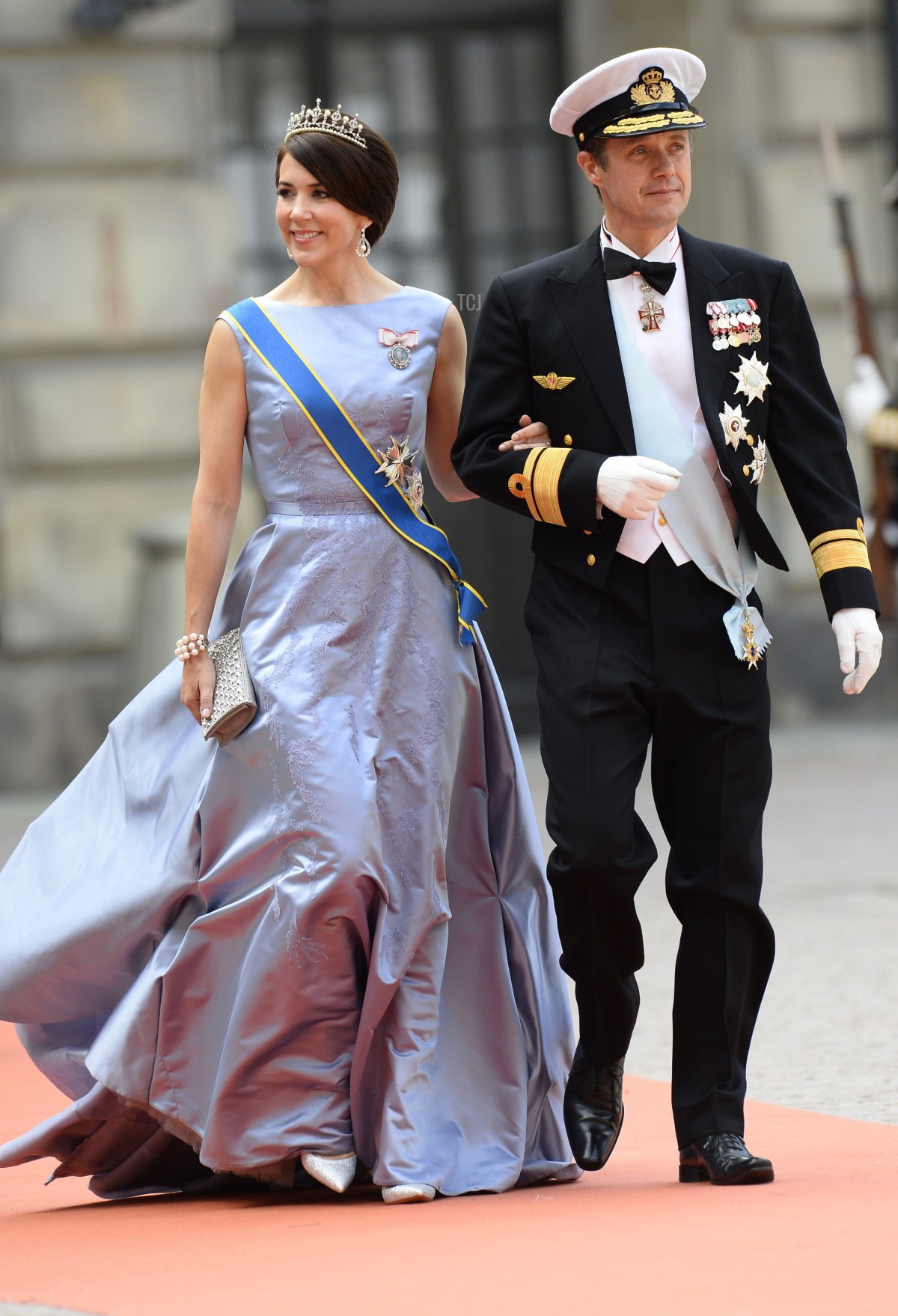 Crown Princess Mary of Denmark (L) and Crown Prince Frederik of Denmark arrive for the wedding of Sweden's Crown Prince Carl Philip and Sofia Hellqvist at Stockholm Palace on June 13, 2015