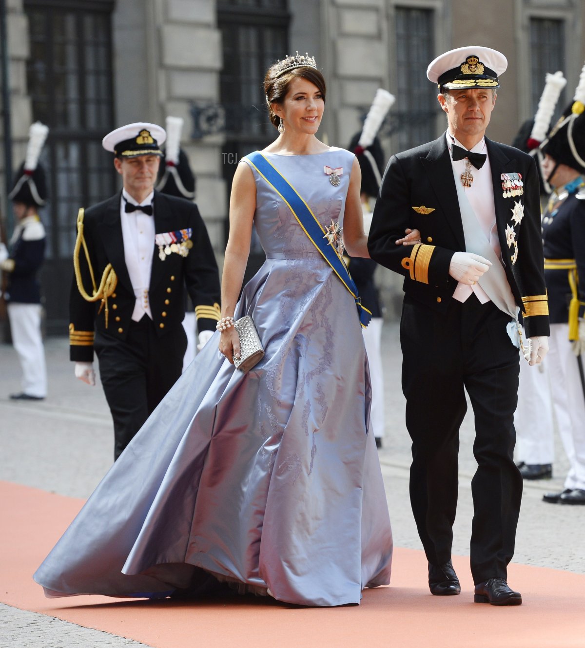 Crown Princess Mary of Denmark (L) and Crown Prince Frederik of Denmark arrive for the wedding of Sweden's Crown Prince Carl Philip and Sofia Hellqvist at Stockholm Palace on June 13, 2015