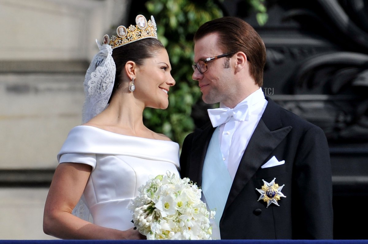 Crown Princess Victoria of Sweden, Duchess of Västergötland, and her husband Prince Daniel, Duke of Västergötland, meet the general public as they appear on the Lejonbacken Terrace after their wedding ceremony on June 19, 2010 in Stockholm, Sweden