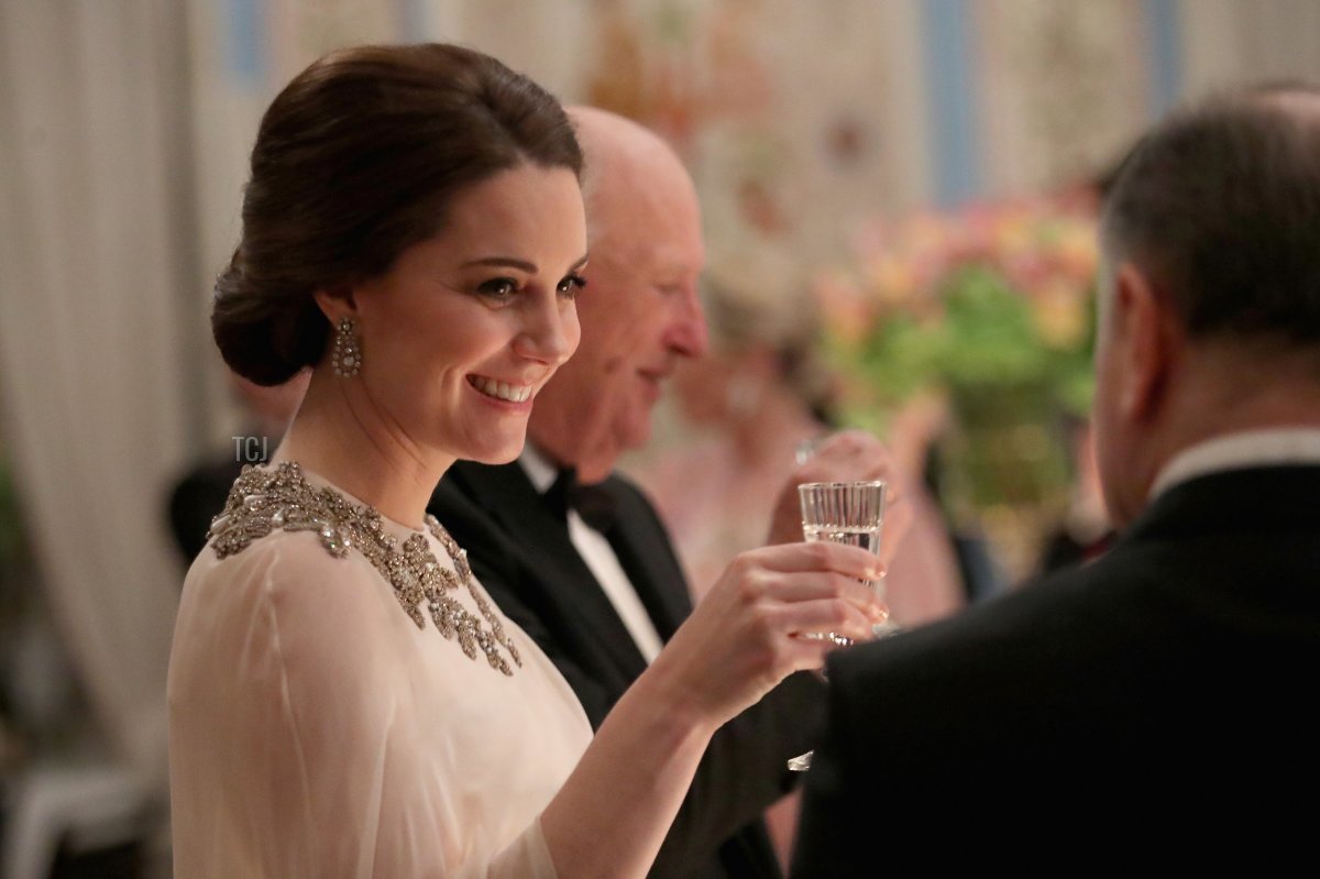 Catherine, Duchess of Cambridge smiles during a dinner at the Royal Palace with Prince William, Duke of Cambridge on day 3 of their visit to Sweden and Norway on February 1, 2018 in Oslo, Norway
